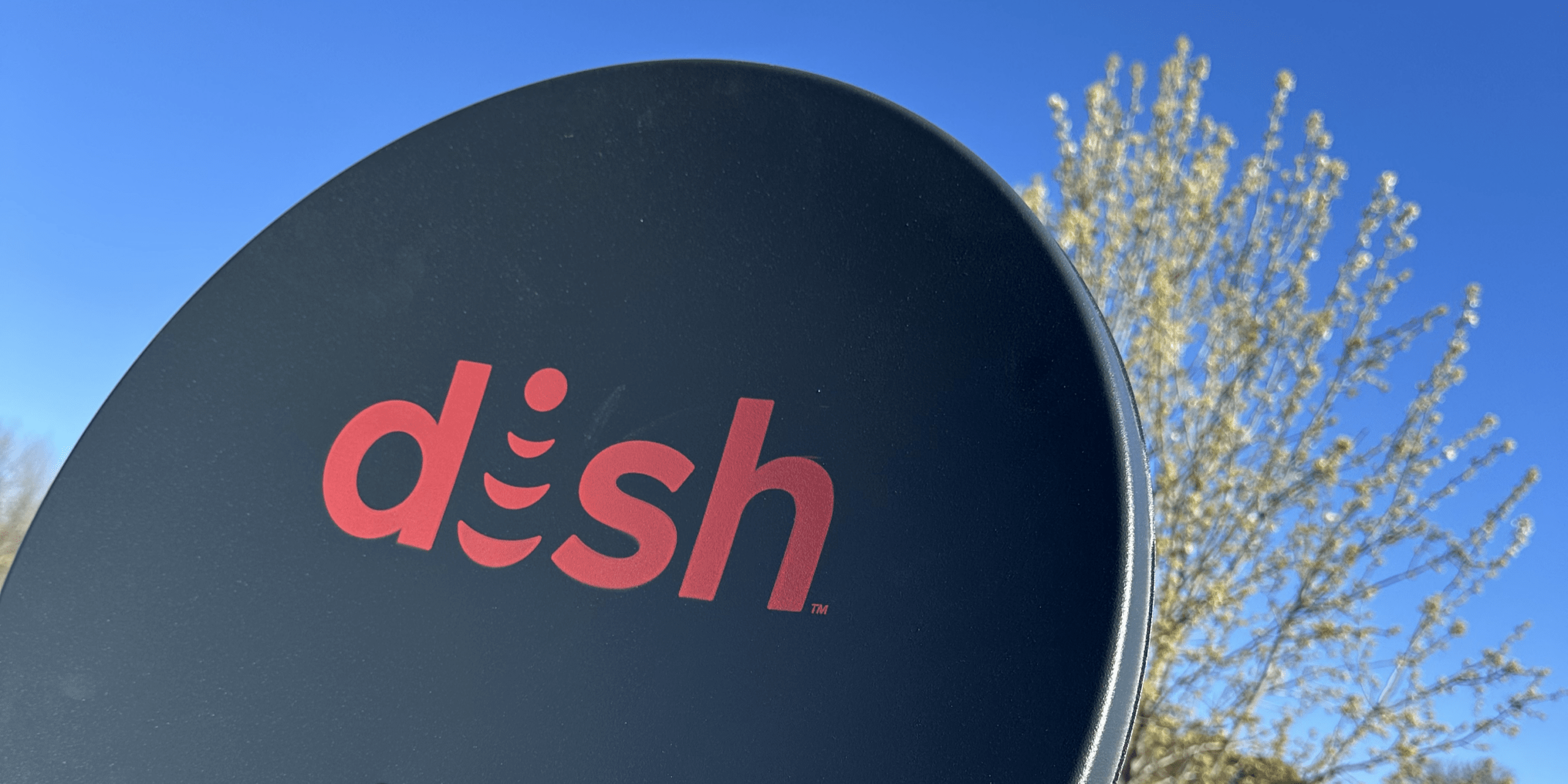 A DISH satellite dish against a clear blue sky in the Treasure Valley